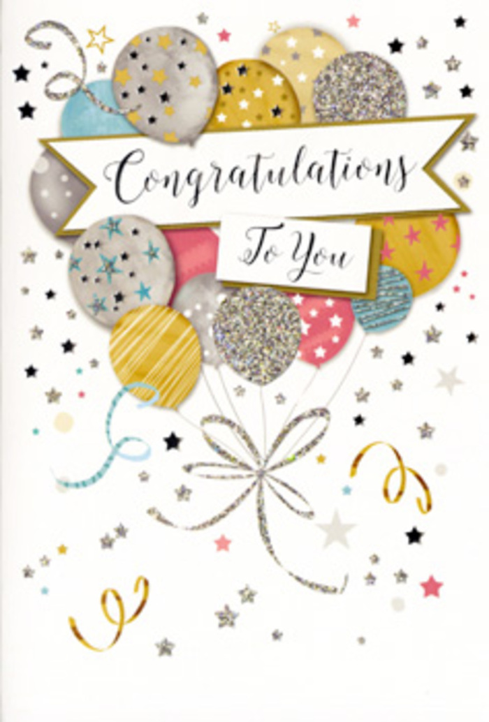 A refined congratulations card is shown in close-up, its artwork echoing the feeling of a smart celebration at a Crouch End dinner table, with flowers on one side and this card propped proudly among the glasses. At the centre, a loose bouquet of illustrated balloons rises gracefully, their rounded shapes arranged like a florist's display, carefully layered so each colour peeks through. Soft metallic gold, silver, champagne beige, airy blue, and gentle blush pink create a harmonious, slightly shimmery palette. Some balloons are washed with fine horizontal stripes, others sprinkled with tiny stars or speckled as if brushed with very fine glitter, suggesting texture without overwhelming the design. From the base of the balloon cluster, narrow ribbons sweep down in elegant curls of gold and silver, drawn with a calligrapher's precision, their curves as fluid as the ribbons we tie around hand-tied bouquets at Flowers Crouch End. A wide, unfurling banner drifts across the middle of the card, almost like a ribbon floating through the arrangement, bearing the words Congratulations To You in graceful, looping script that feels slightly embossed. Surrounding the central motif, the background is dotted with small, metallic stars, delicate spots of confetti, and whimsical swirls that mirror the tumble of party streamers you might see after a celebration in a home off Park Road. The card's overall atmosphere is one of poised festivity-light, elegant, and full of quiet pride. It's the sort of design that pairs effortlessly with a bouquet for graduations, work promotions, or personal milestones, offering a visual expression of joy that lingers long after the occasion has passed.